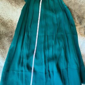 So cute!  More like a teal color. With now detail on the neck. Forgiving a line